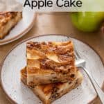 Two slices of apple cake stacked on a plate. Text overlay includes recipe name.