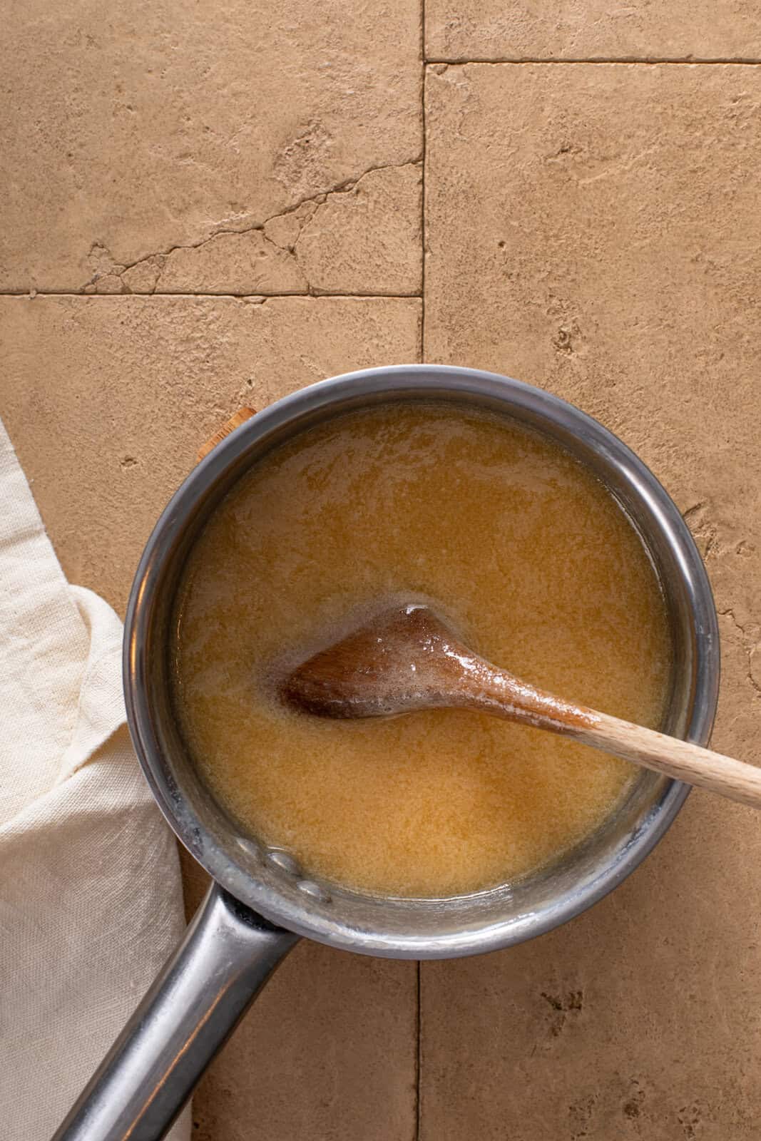 Apple cake dessert sauce in a saucepan.