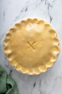Unbaked chicken pot pie ready to go in the oven.