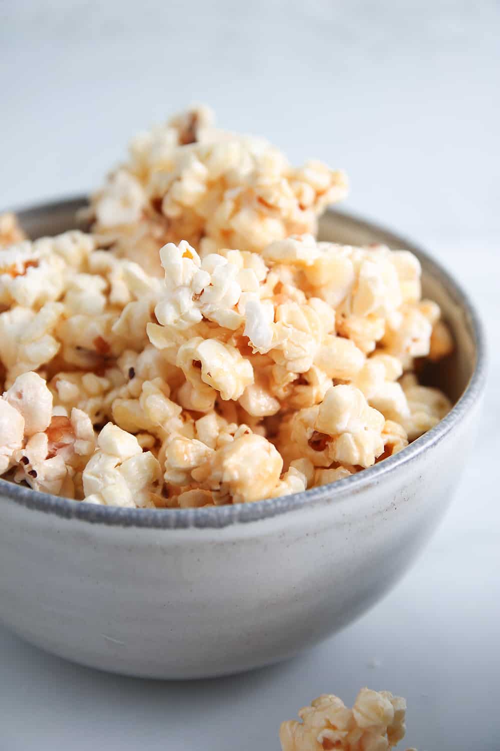 Close up of a bowl filled with microwave caramel corn