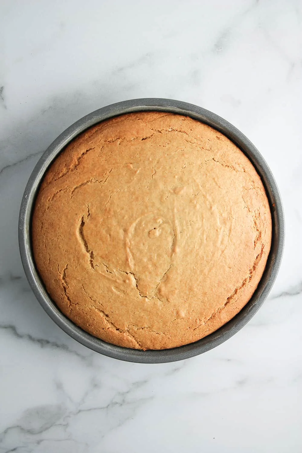 Layers of Peanut Butter Cake are the perfect base for peanut butter cream cheese frosting.