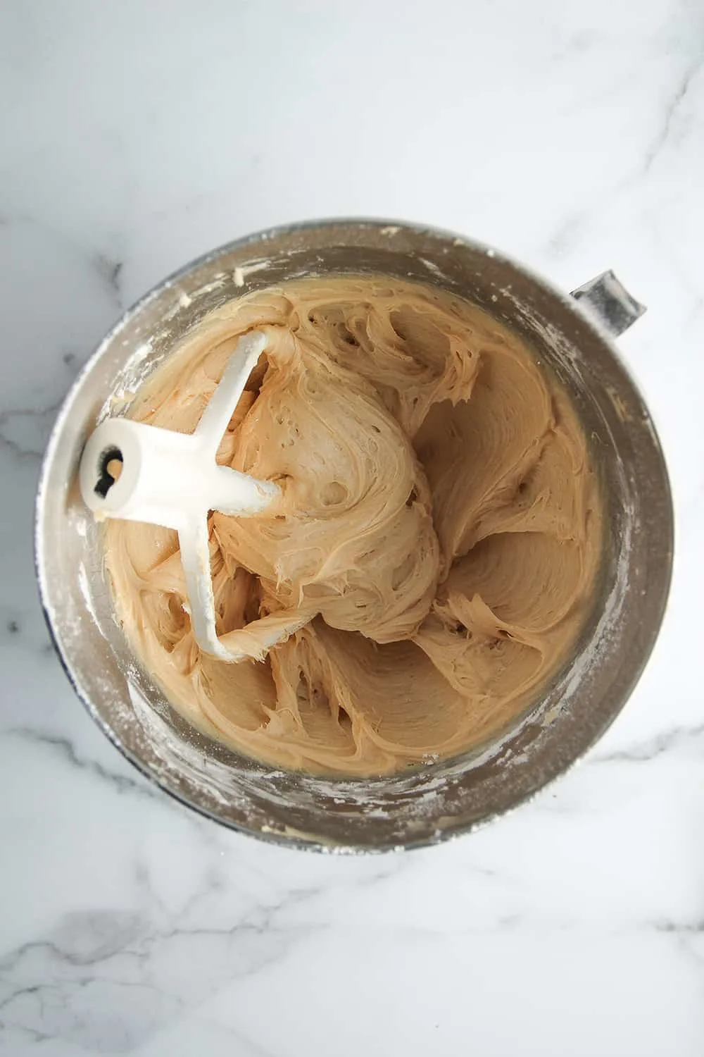 Peanut butter cream cheese frosting is a delicious addition to Peanut Butter Cake