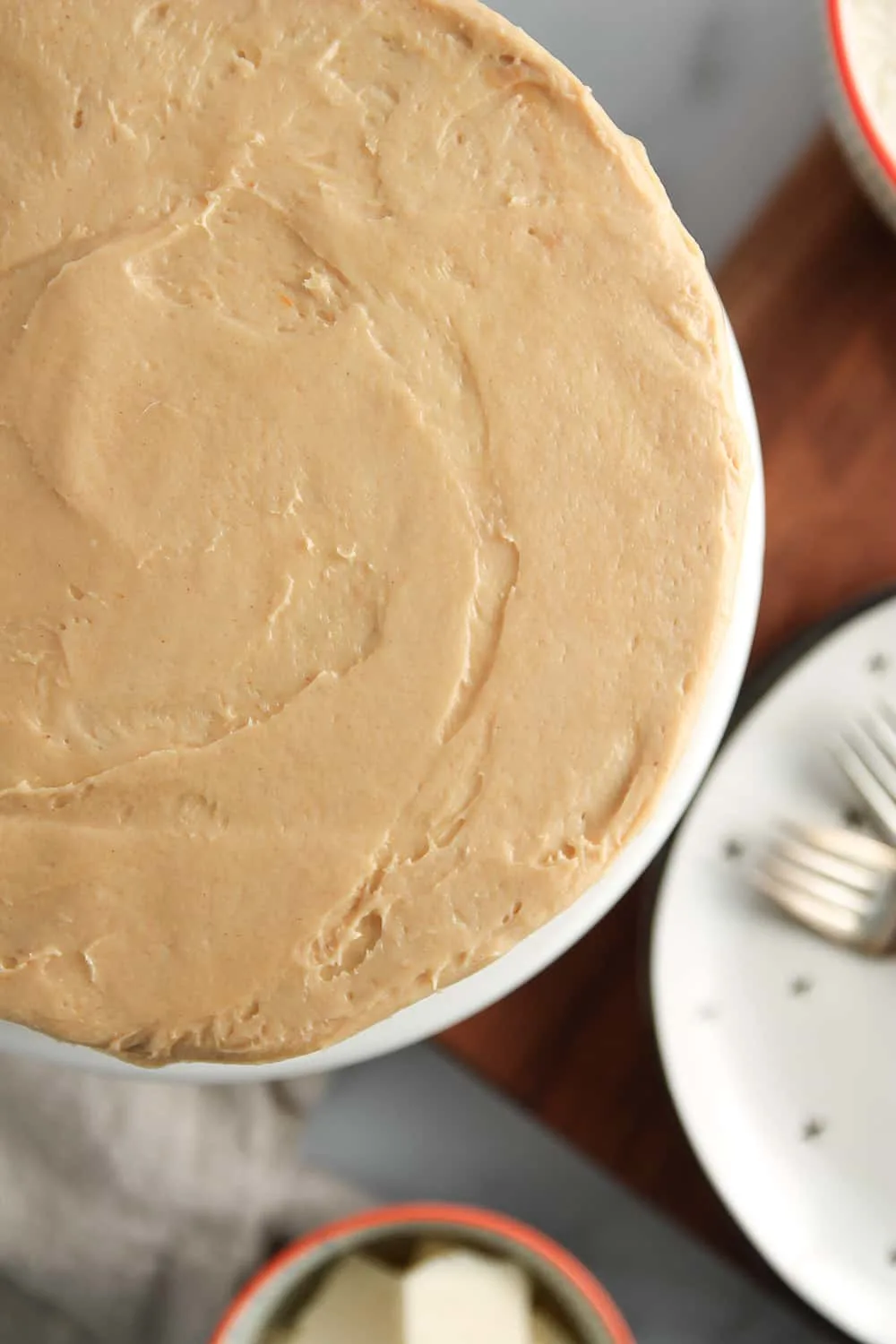 Peanut butter cream cheese frosting is a tangy and sweet addition to Peanut Butter Cake