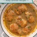Finished garlic chicken in a skillet. Text overlay includes recipe name.