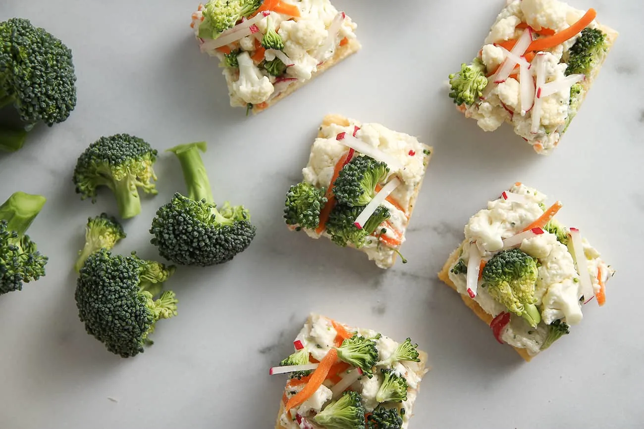 Crescent roll dough, ranch cream cheese and veggies combine to make delicious Vegetable Pizza.