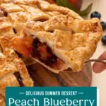 Hand lifting up a pie server holding a slice of peach blueberry pie. Text overlay includes recipe name.