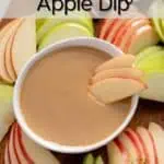 Apple slices arranged in a bowl of apple dip set on a board with sliced apples. Text overlay includes recipe name.