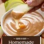Apple slice dipping in caramel apple dip being held over a bowl of the dip. Text overlay includes recipe name.
