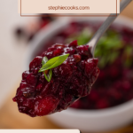 Spoon holding up a bite of cranberry chutney. Text overlay includes recipe name.