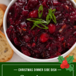 Overhead image of cranberry chutney in a white bowl, garnished with green onions. Text overlay includes recipe name.