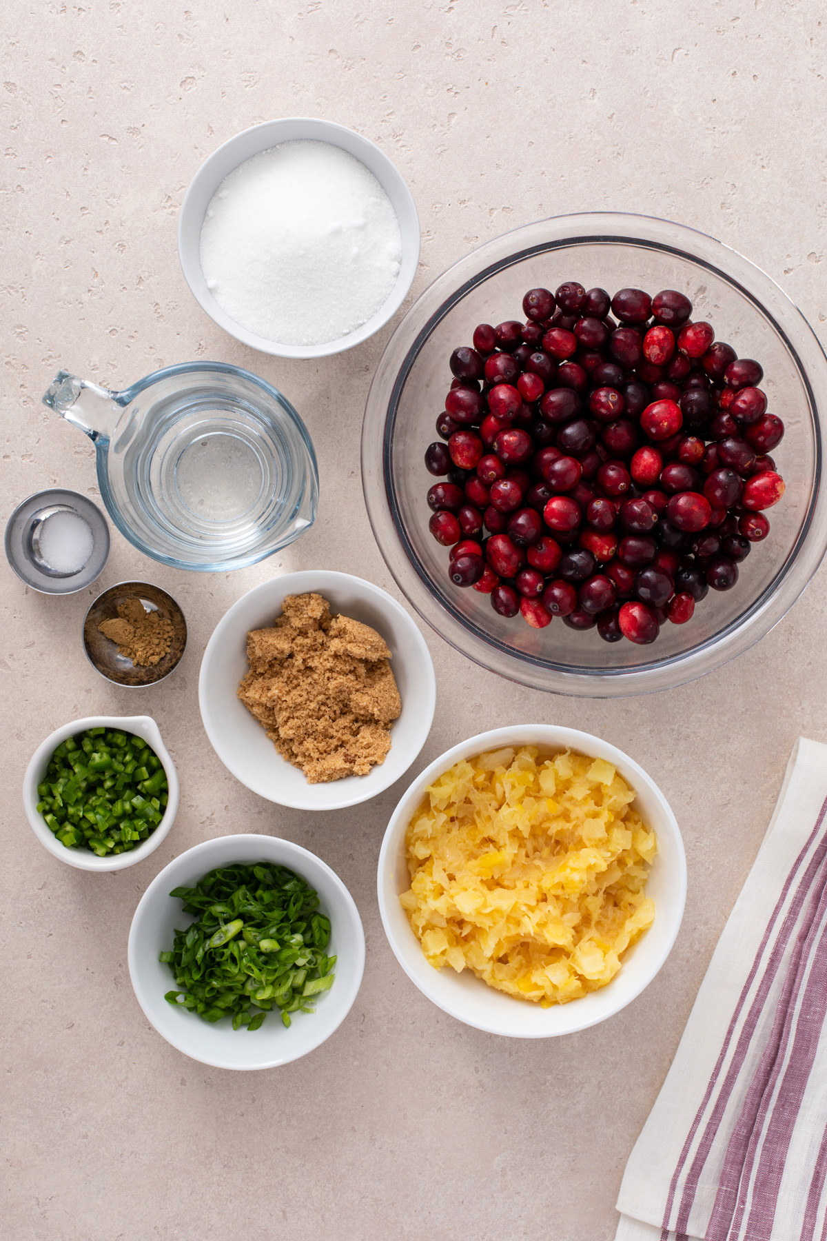 Ingredients for cranberry jalapeño chutney on a countertop.