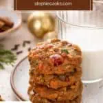 Four fruitcake cookies stacked on a plate in front of a glass of milk. Text overlay includes recipe name.