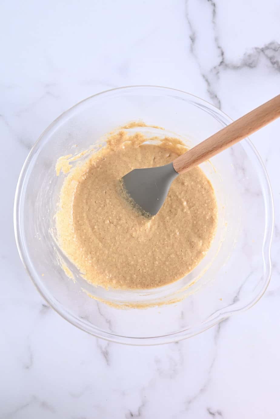 Batter base for fruitcake cookies in a glass bowl.