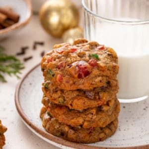Four stacked fruitcake cookies.