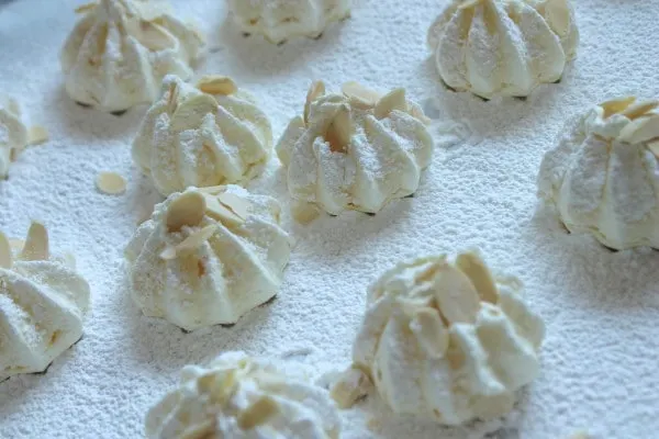 Orange almond meringues