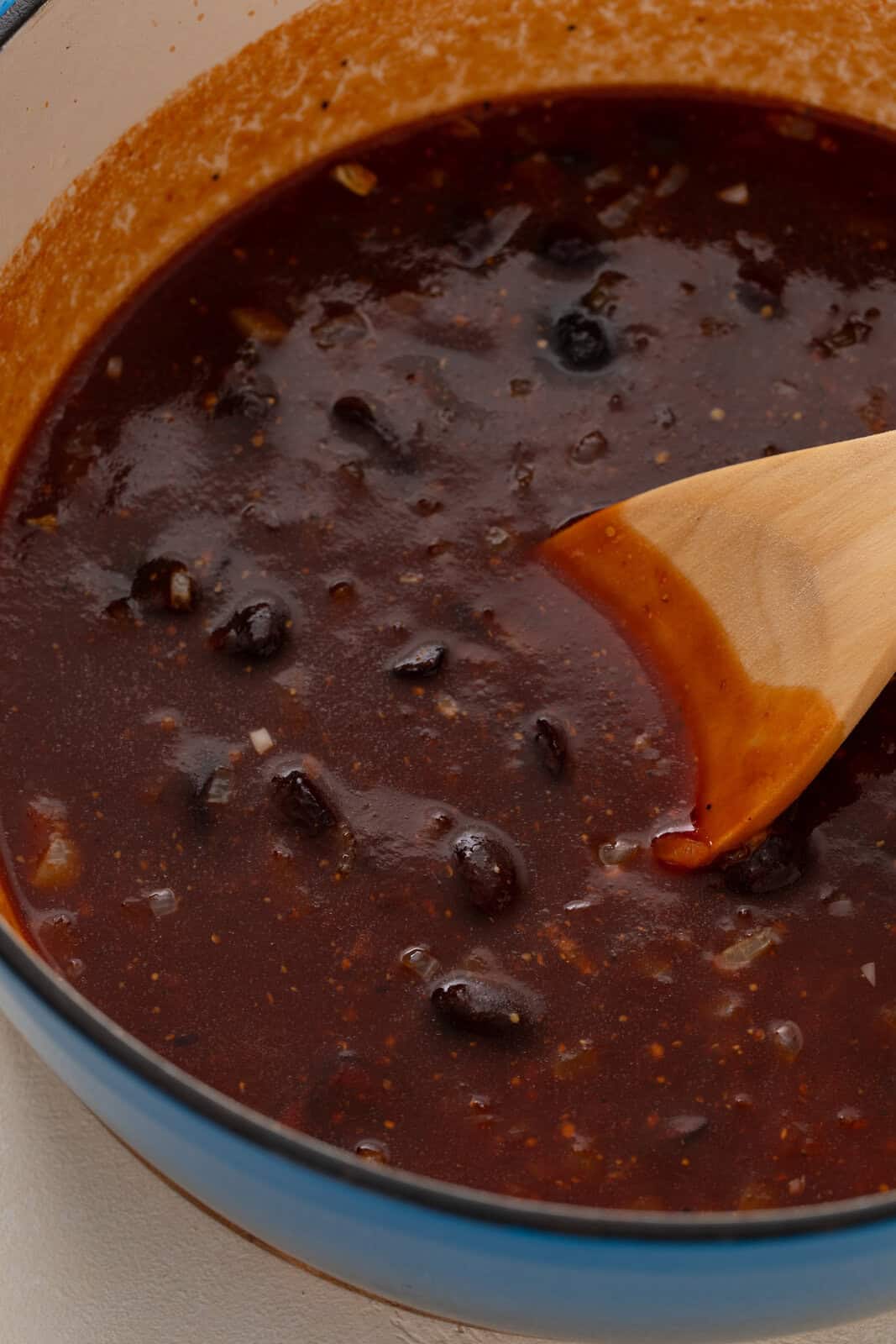 Ingredients for cherry barbecue sauce in a pot, about to be simmered.
