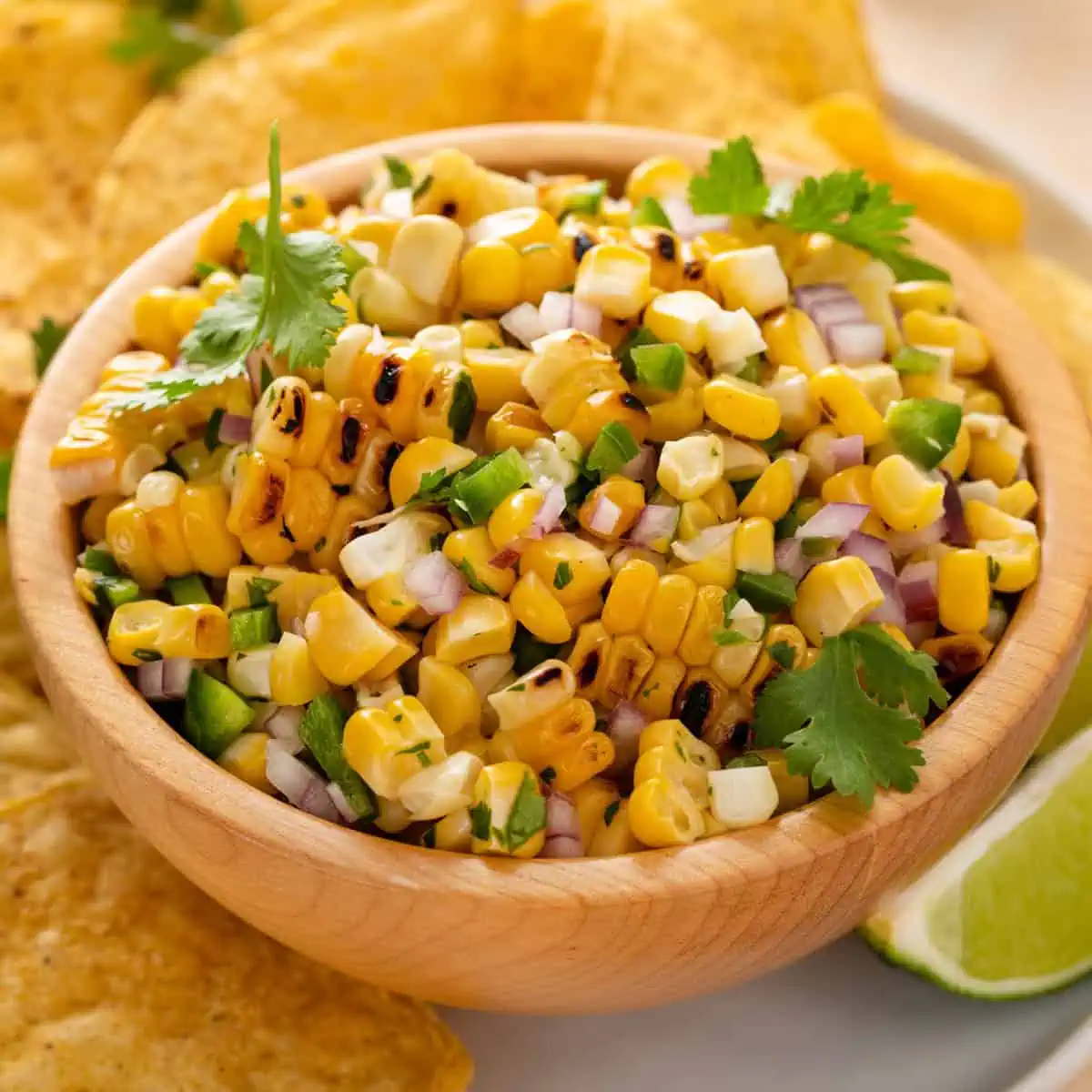 Close up bowl of roasted corn salsa.
