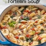 Cooked tortellini soup in a blue dutch oven. Text overlay includes recipe name.
