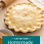 Unbaked pie, assembled and ready to be baked, set on a countertop. Text overlay includes recipe name.