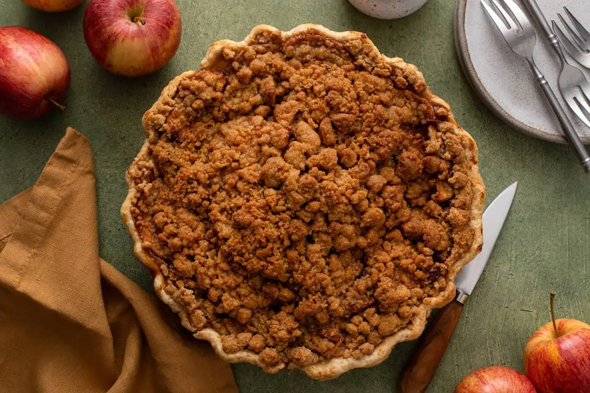 Cooled dutch apple pie on a countertop.