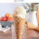 Glass jar holding up a waffle cone filled with peach ice cream. Text overlay includes recipe title.