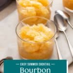 Three glasses of bourbon slush next to spoons on a marble board. Text overlay includes recipe name.