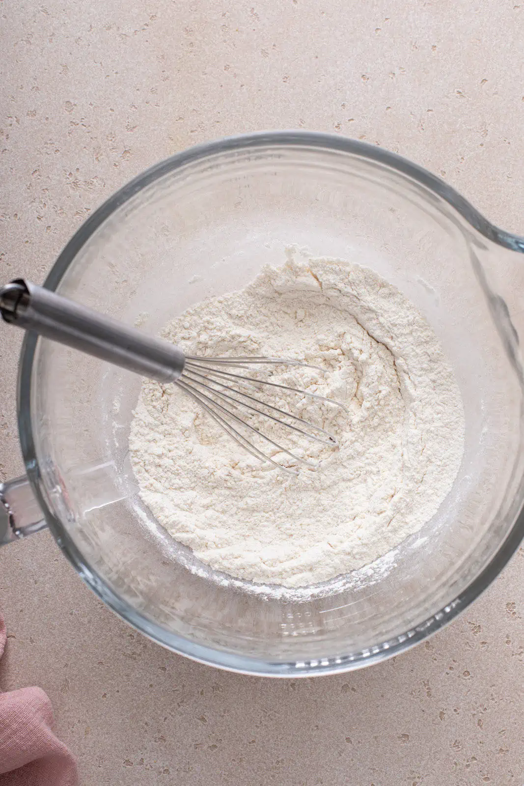 Dry ingredients for texas roadhouse rolls in a mixing bowl.