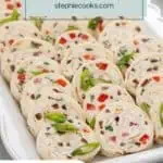 Sliced cream cheese ranch roll ups arranged in rows on a white platter. Text overlay includes recipe name.