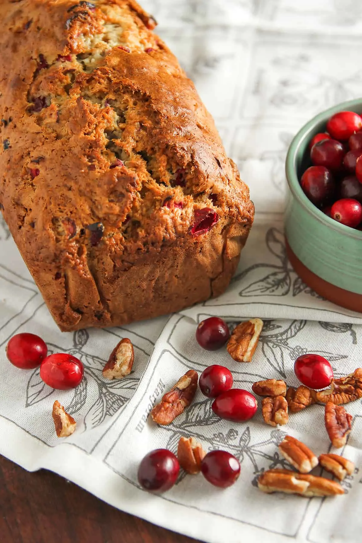 Cranberry Nut Bread is a delicious quick bread for the holiday season. Chock full of fresh cranberries and pecans, this is an easy quick bread you’ll want to make again and again.