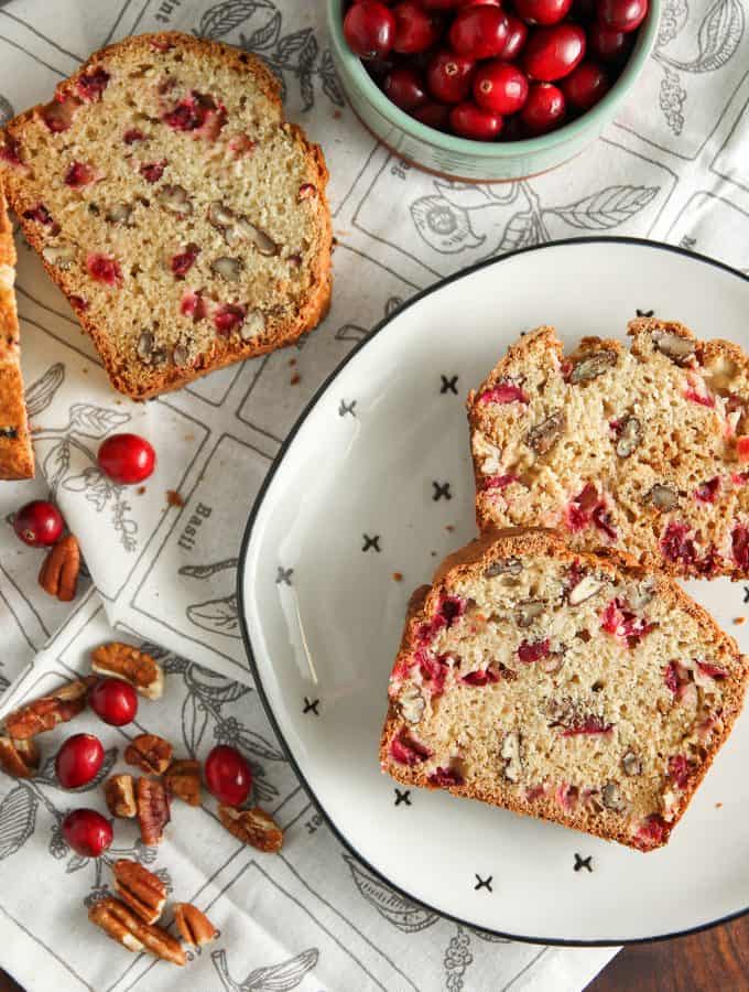 Cranberry Nut Bread is perfect for the holiday season. Full of fresh cranberries and pecans, this is an easy quick bread you’ll want to make again and again.