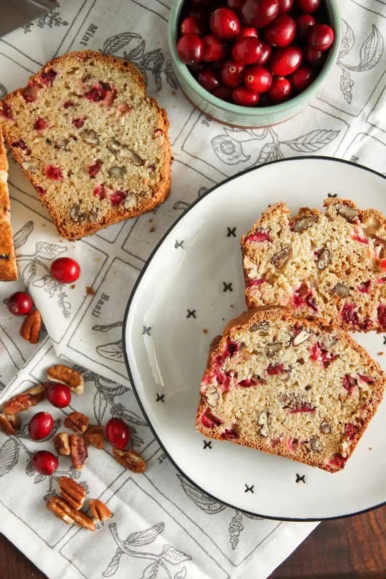 Cranberry Nut Bread is perfect for the holiday season. Full of fresh cranberries and pecans, this is an easy quick bread you’ll want to make again and again.