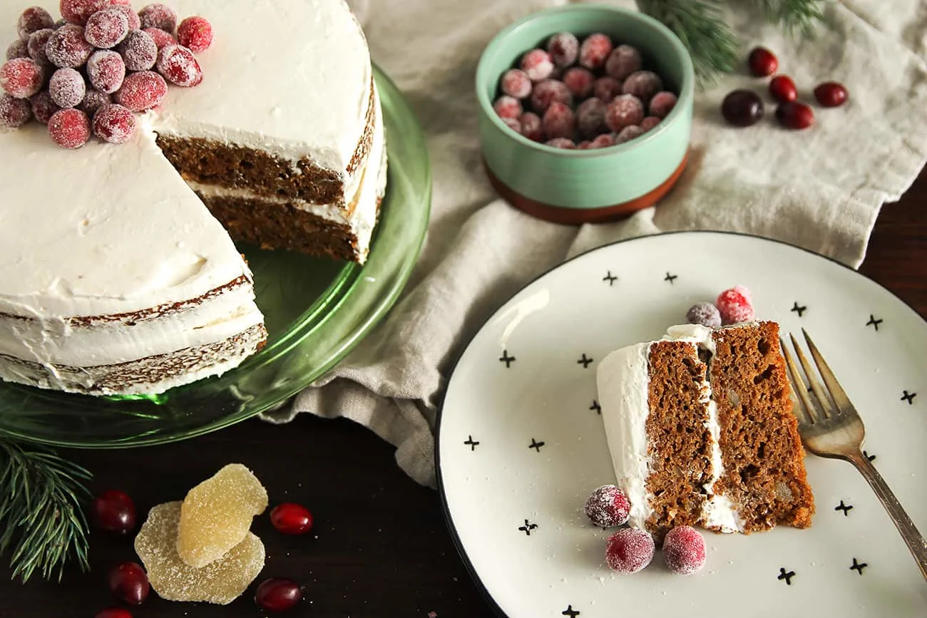 Gingerbread Layer Cake: Two layers of gingerbread cake topped with whipped cream frosting and sugared cranberries. It's wonderfully festive!