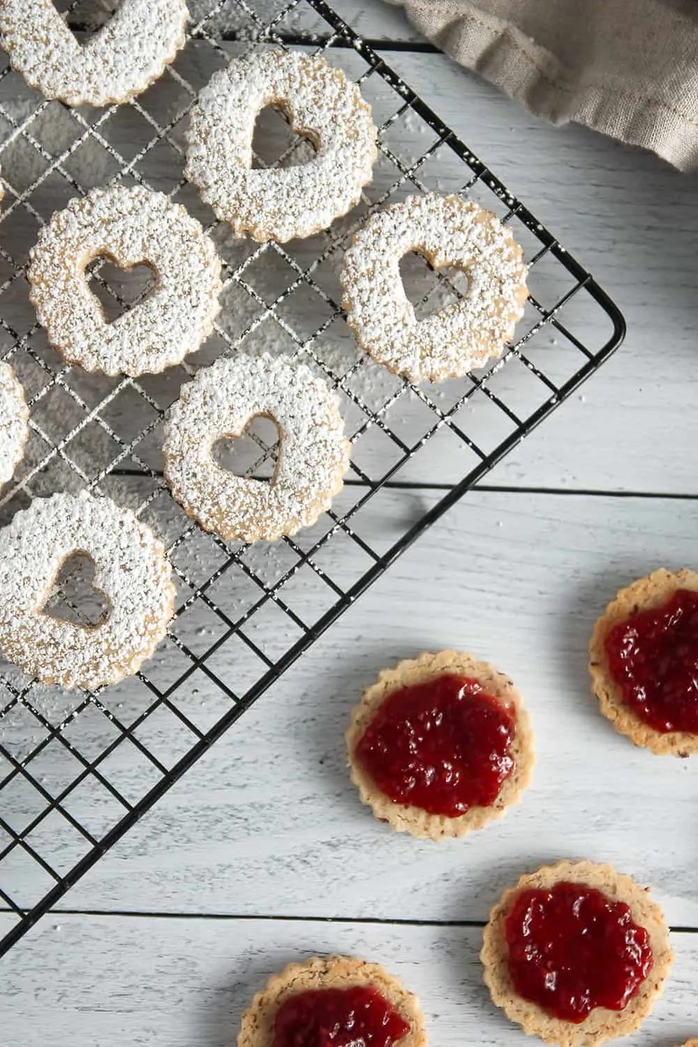 Raspberry Linzer Cookies are a sweet and beautiful way to celebrate Valentine's Day!