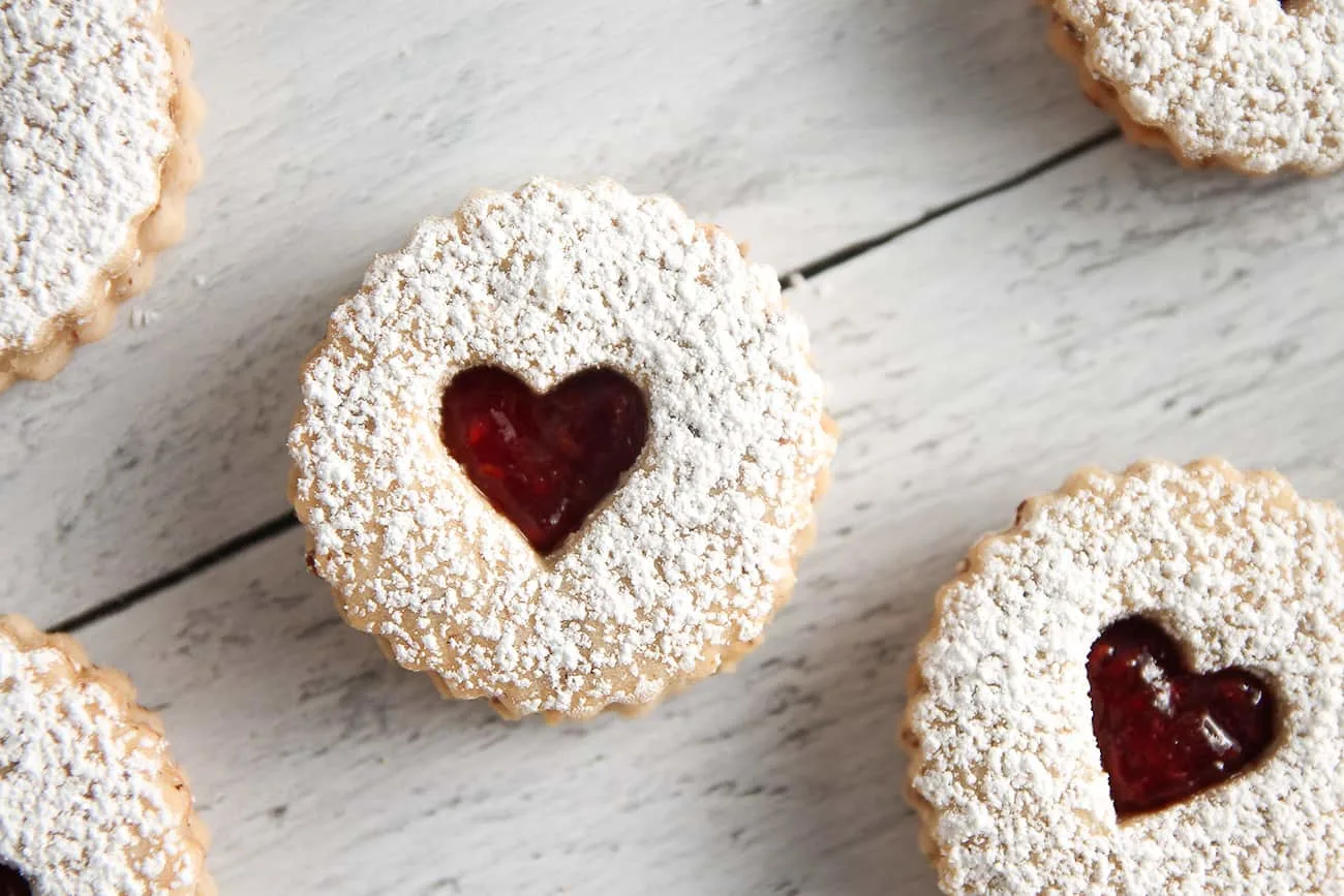Raspberry Linzer Cookies are a sweet addition to any day, but especially Valentine's Day!