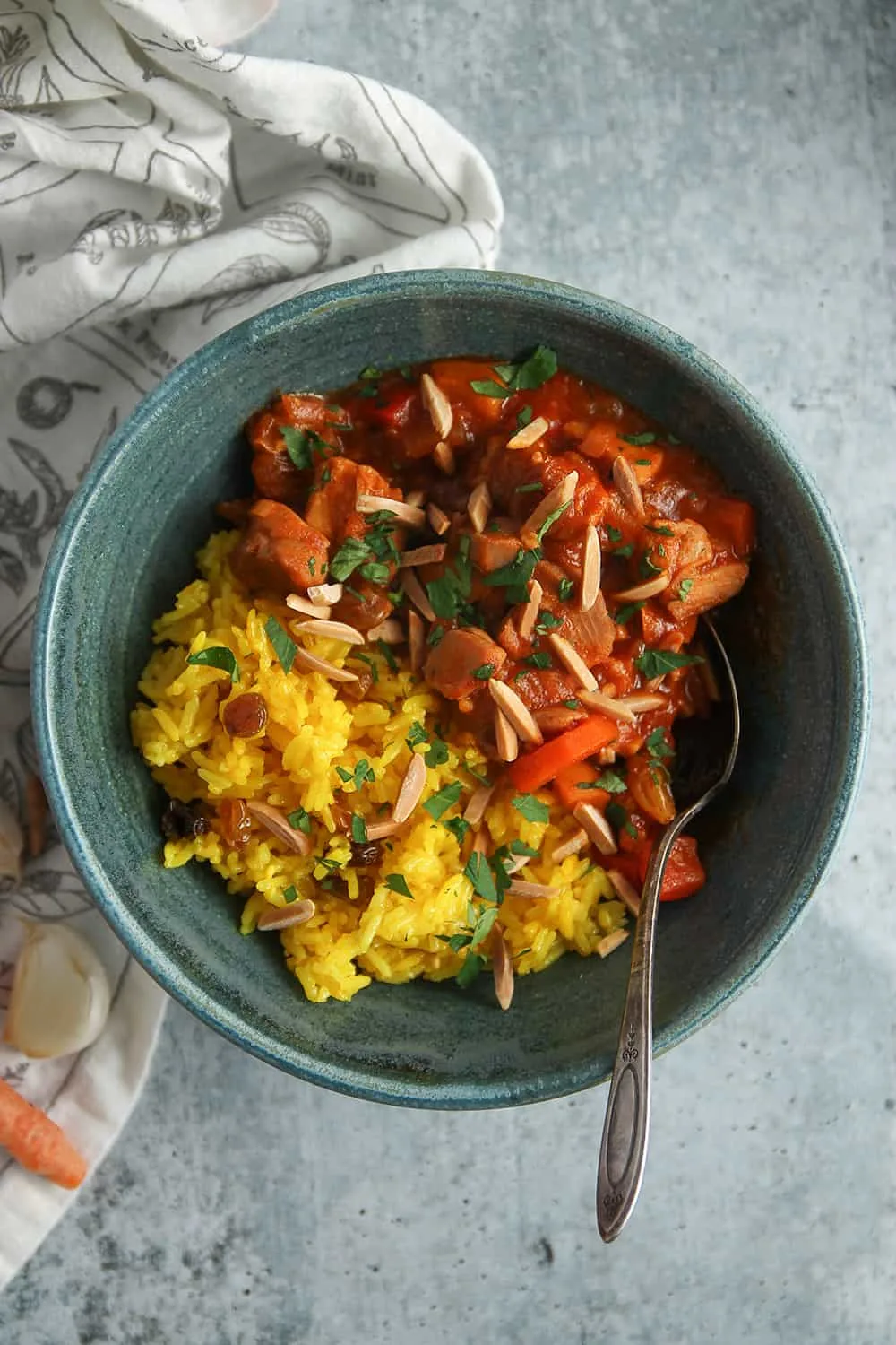 Quick Moroccan Chicken Stew is a flavorful weeknight meal, packed full of tender chicken and rich spices. Serve it alongside Ginger-Turmeric Rice for complete meal all in one bowl!