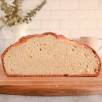 Cross-section view of paska on a wooden cutting board