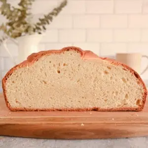 Cross-section view of paska on a wooden cutting board