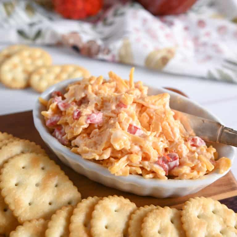 White bowl of pimento cheese.