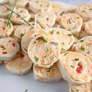 Pimento cheese pinwheels with toothpicks in them, ready to be served.