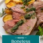 Mint chimichurri being spooned over slices of roasted boneless leg of lamb on a white plate. Text overlay includes recipe name.