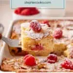 Cake server lifting a slice of raspberry almond coffee cake out of a cake pan. Text overlay includes recipe name.