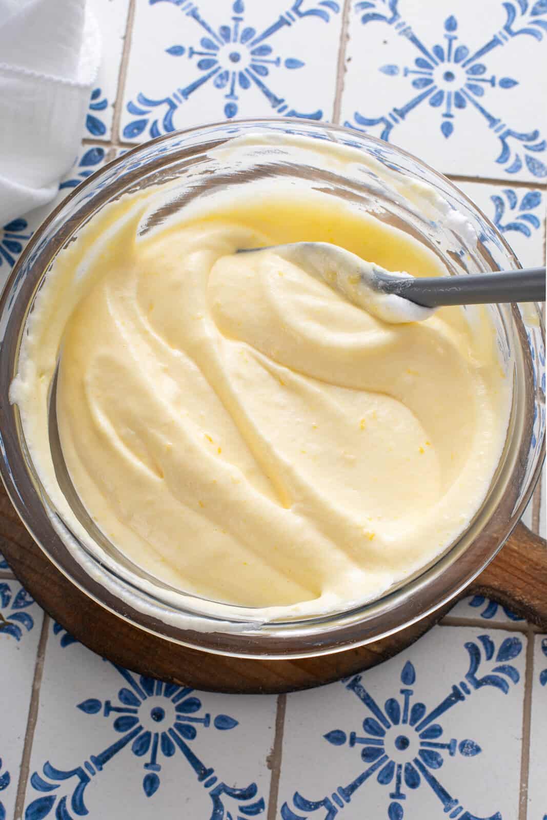 Lemon chiffon filling folded in a glass bowl.