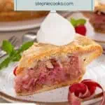 Plated slice of raspberry rhubarb pie topped with a dollop of whipped cream. Text overlay includes recipe name.
