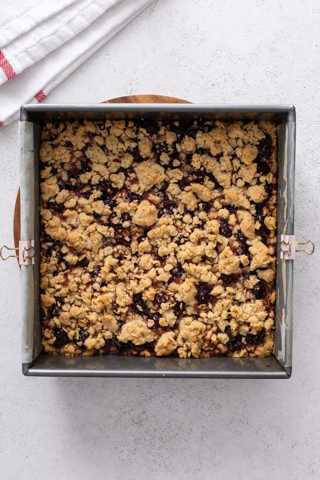 Baked sour cherry bars cooling in the baking pan.