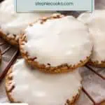 Close up of iced oatmeal cookies arranged on a rack. Text overlay includes recipe name.
