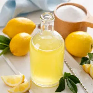 Bottle filled with easy lemon syrup.