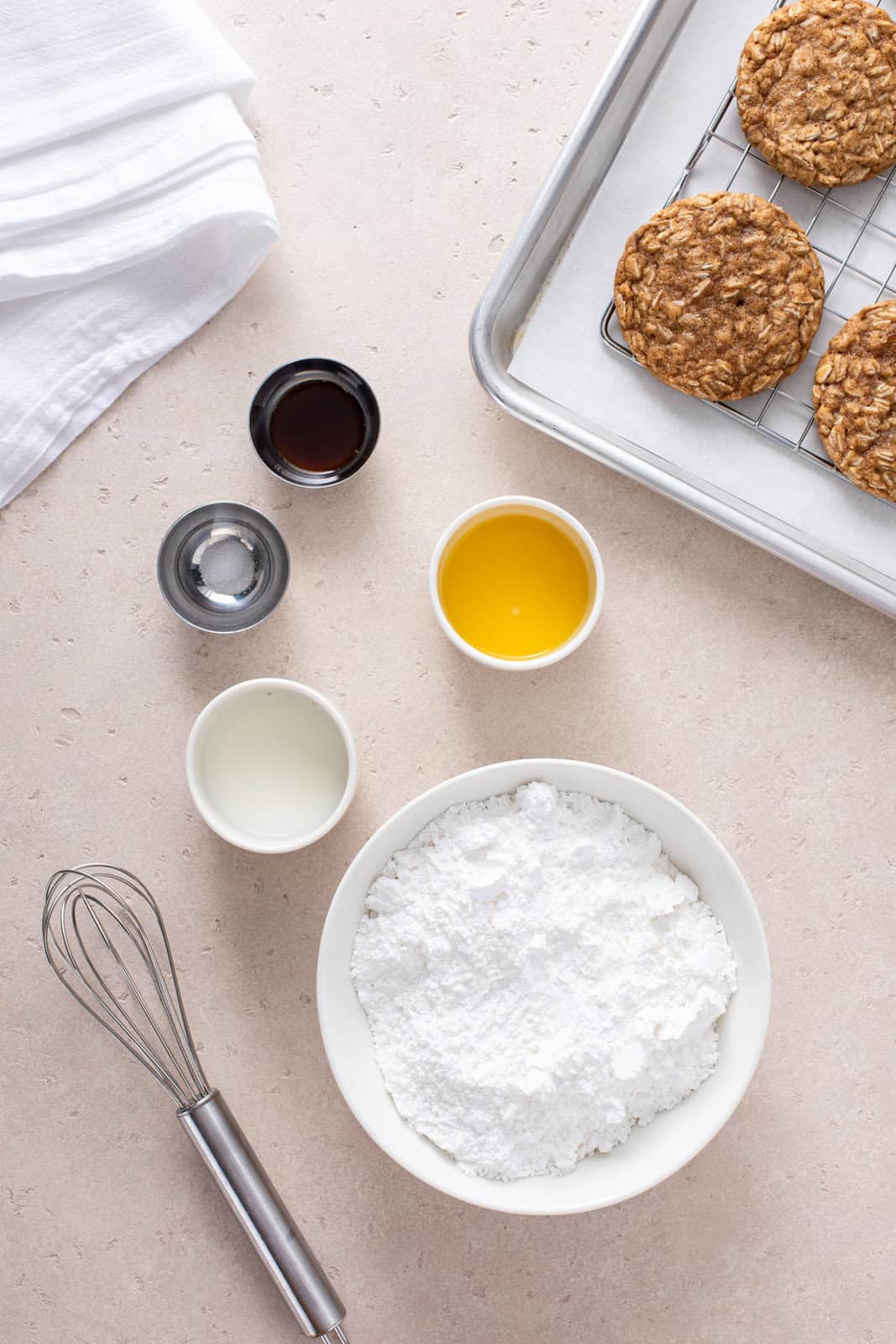 Oatmeal cookie icing ingredients arranged on a countertop.