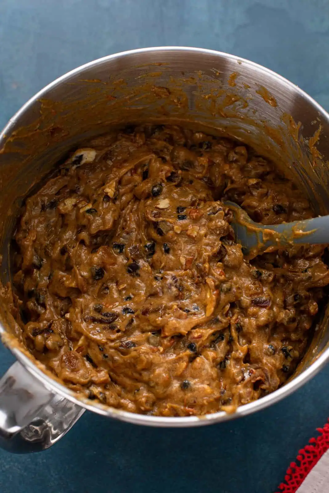 Old-fashioned fruitcake batter mixed in a bowl.