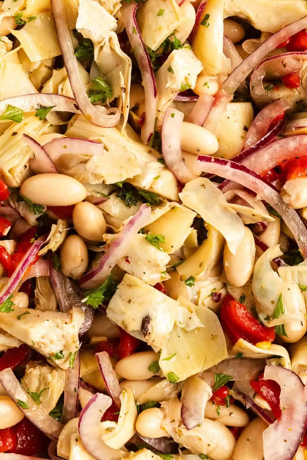 Close up of mixed white bean and artichoke salad.