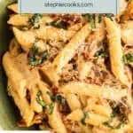 Sun-dried tomato pasta in a bowl garnished with cheese and fresh basil. Text overlay includes recipe name.